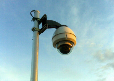Pole-mounted dome security camera.